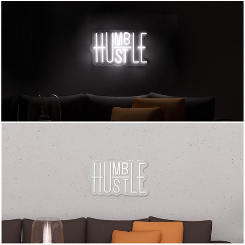 Gameroom or gym ambiance enhanced by the Hustle sign's bright white glow.