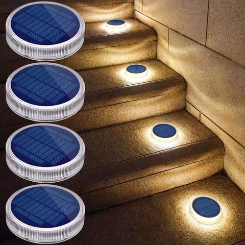 YiLaie LED solar deck light round stick-on illuminates decks at night for safe ambience.