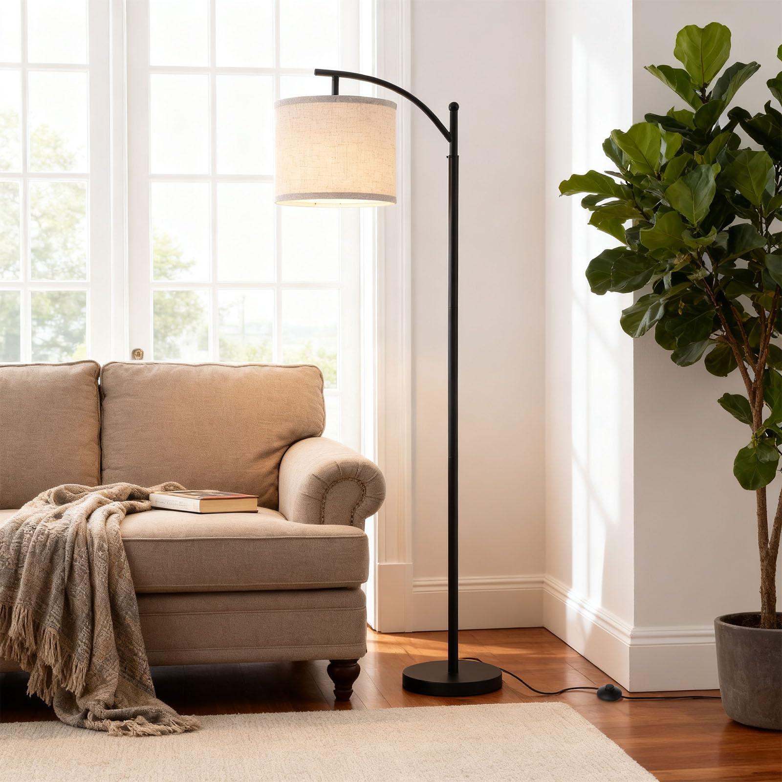 YJSQOEOE Arc Floor Lamp base provides sleek stability in living spaces.