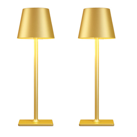 Yogaret 2-pack gold rechargeable table lamps on dining table for cordless dining ambiance.