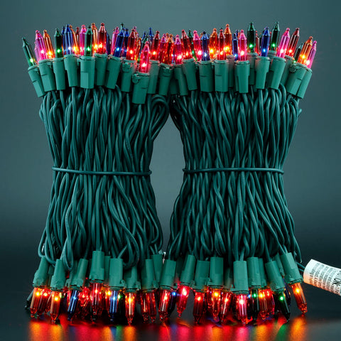 YULETIME multicolor string lights on green wire across a doorway