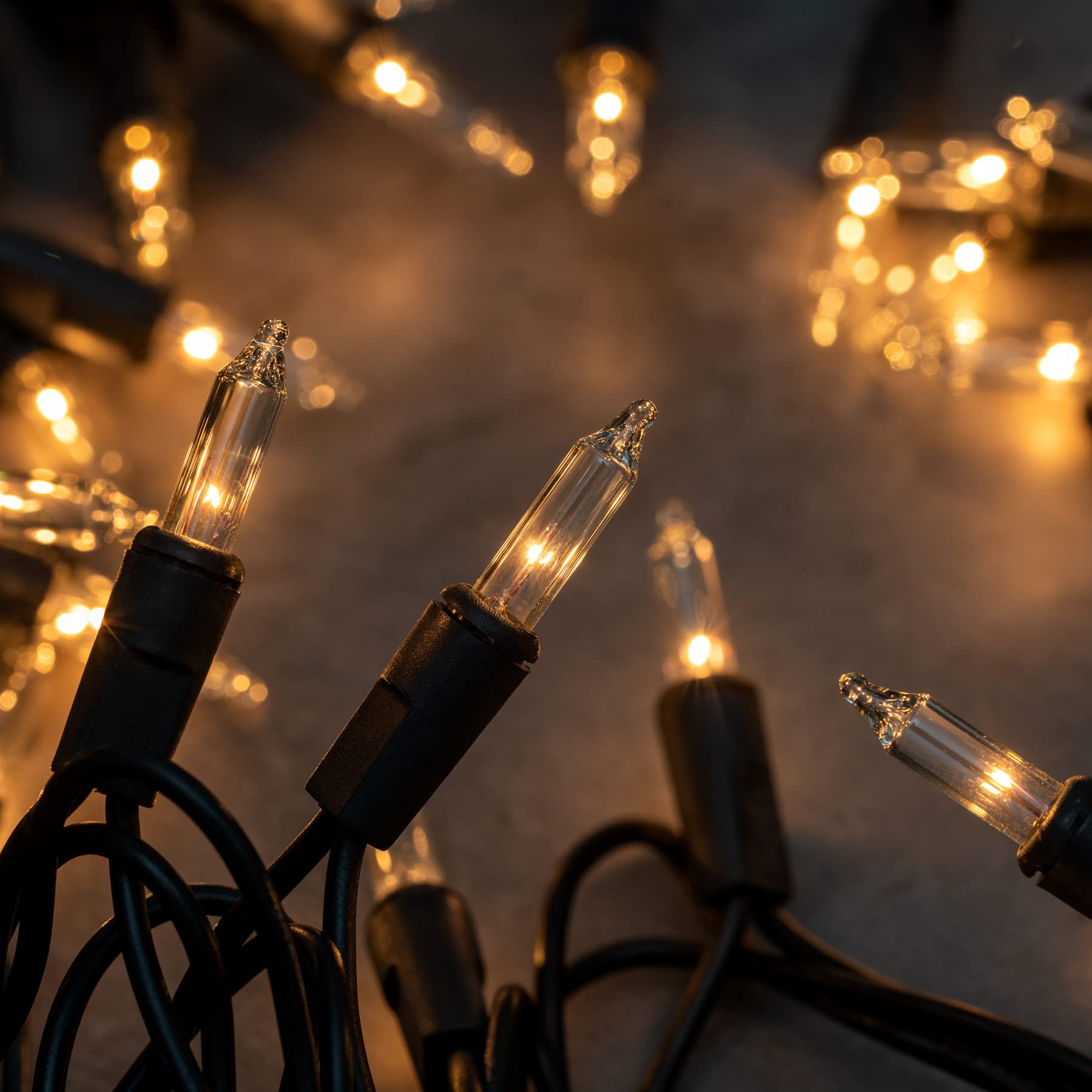 YULETIME clear incandescent bulbs close-up highlighting glass filaments