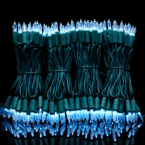 YULETIME cool white bulbs provide bright, steady illumination for trees and fences.