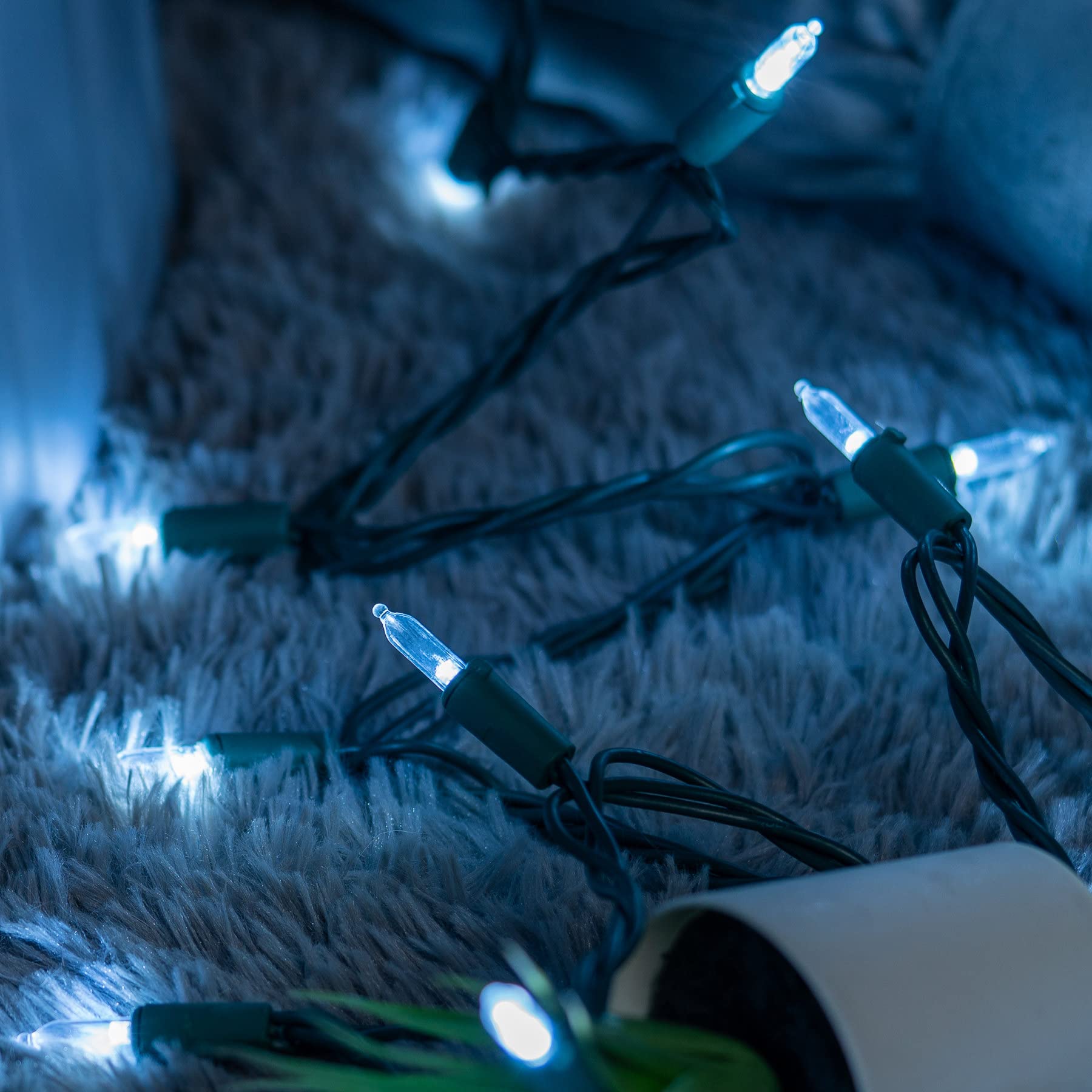 YULETIME green wire blends with greenery for outdoor displays.