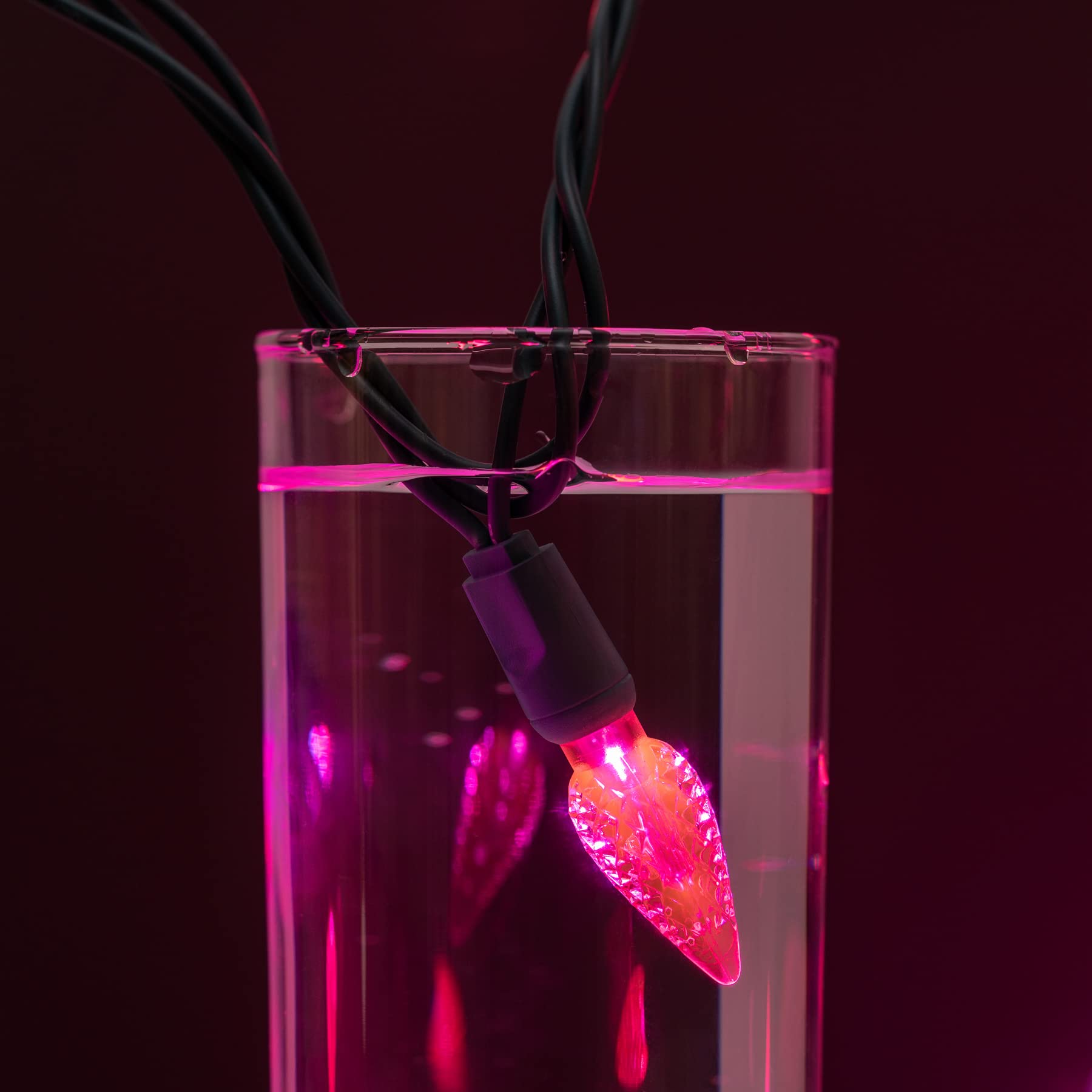 YULETIME pink C6 strawberry lights on green wire for discreet mounting.