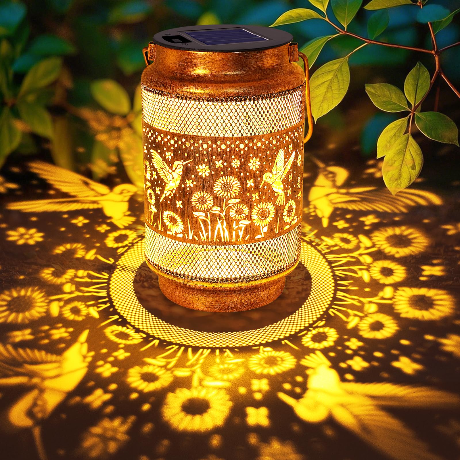 Yulloyello hummingbird lantern in gold bronze casts warm garden glow for patios at night.