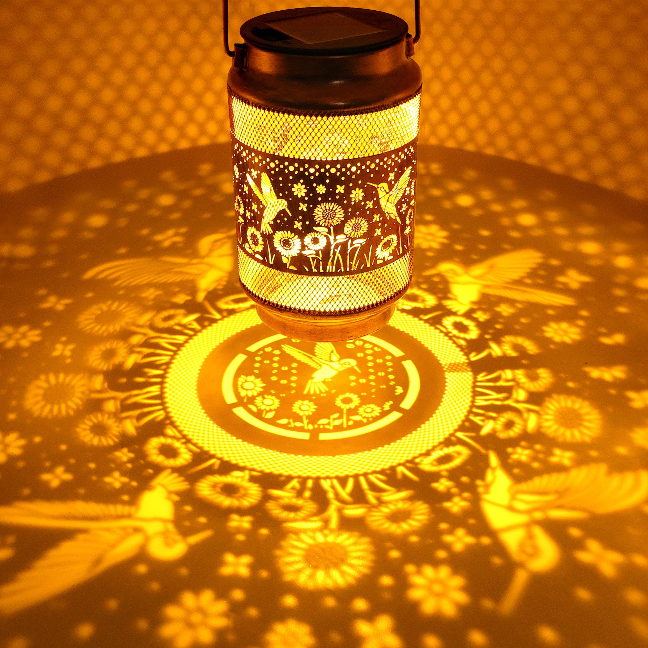 Yulloyello hummingbird-lantern openwork design creates charming light patterns along walkways.