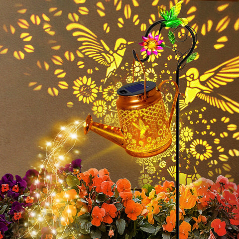Yulloyello solar watering can lights with hummingbird lantern for magical garden evenings.