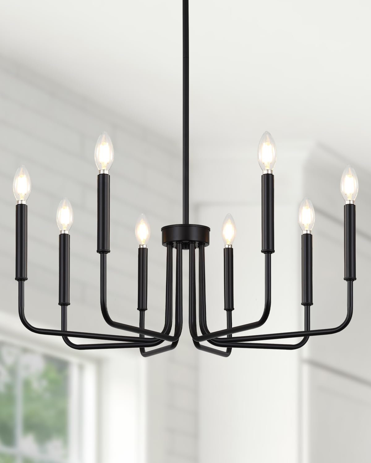 Yunnix 8-light dining chandelier over table with warm, evenly distributed glow