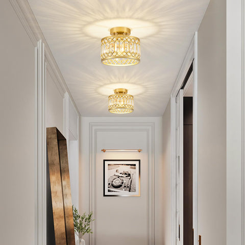 YURNYQ semi-flush crystal fixture adds refined sparkle to living spaces.
