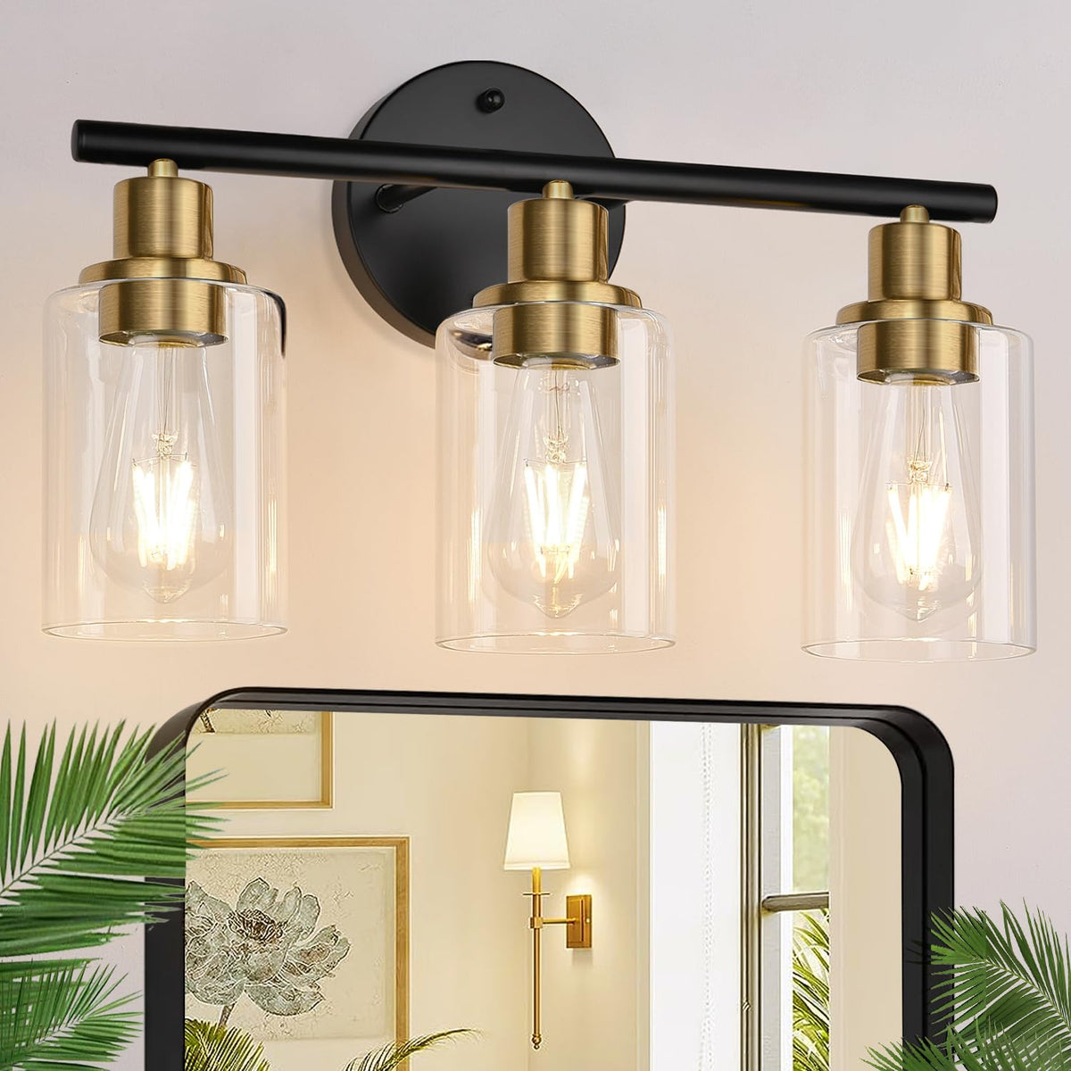 Zarbitta 3-light vanity fixture with clear glass shades brightens modern bathrooms