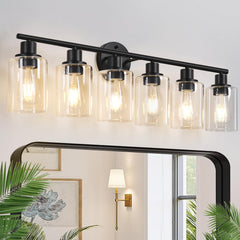 Zarbitta 6-light vanity fixture with matte black finish and clear glass shade for modern bathrooms.