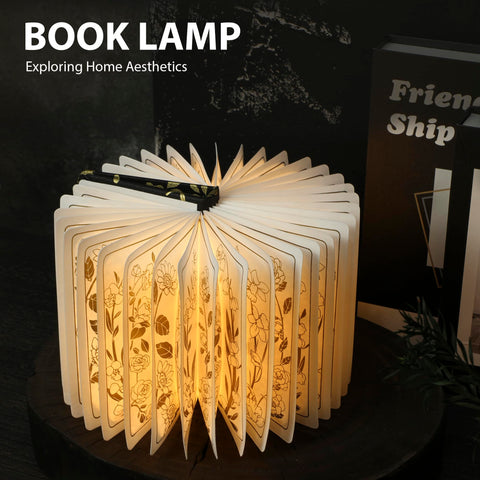 ZBOLE Floral Print Book Light on desk showing 360° adjustability