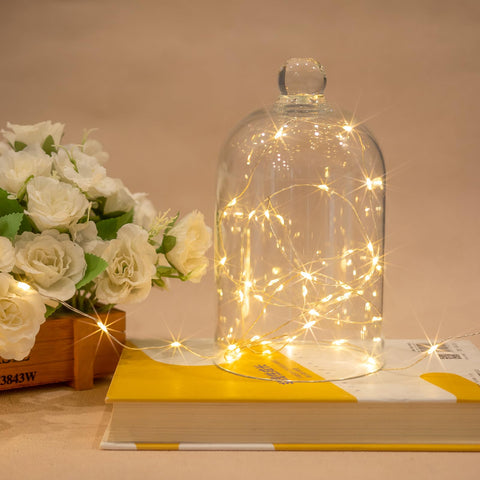 ZELUXDOT warm-white twinkle lights create a cozy bedroom glow.