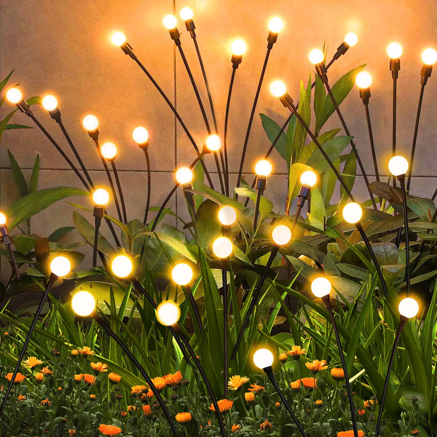 ZFNN solar firefly light ground stake illuminates garden paths with warm, inviting glow.