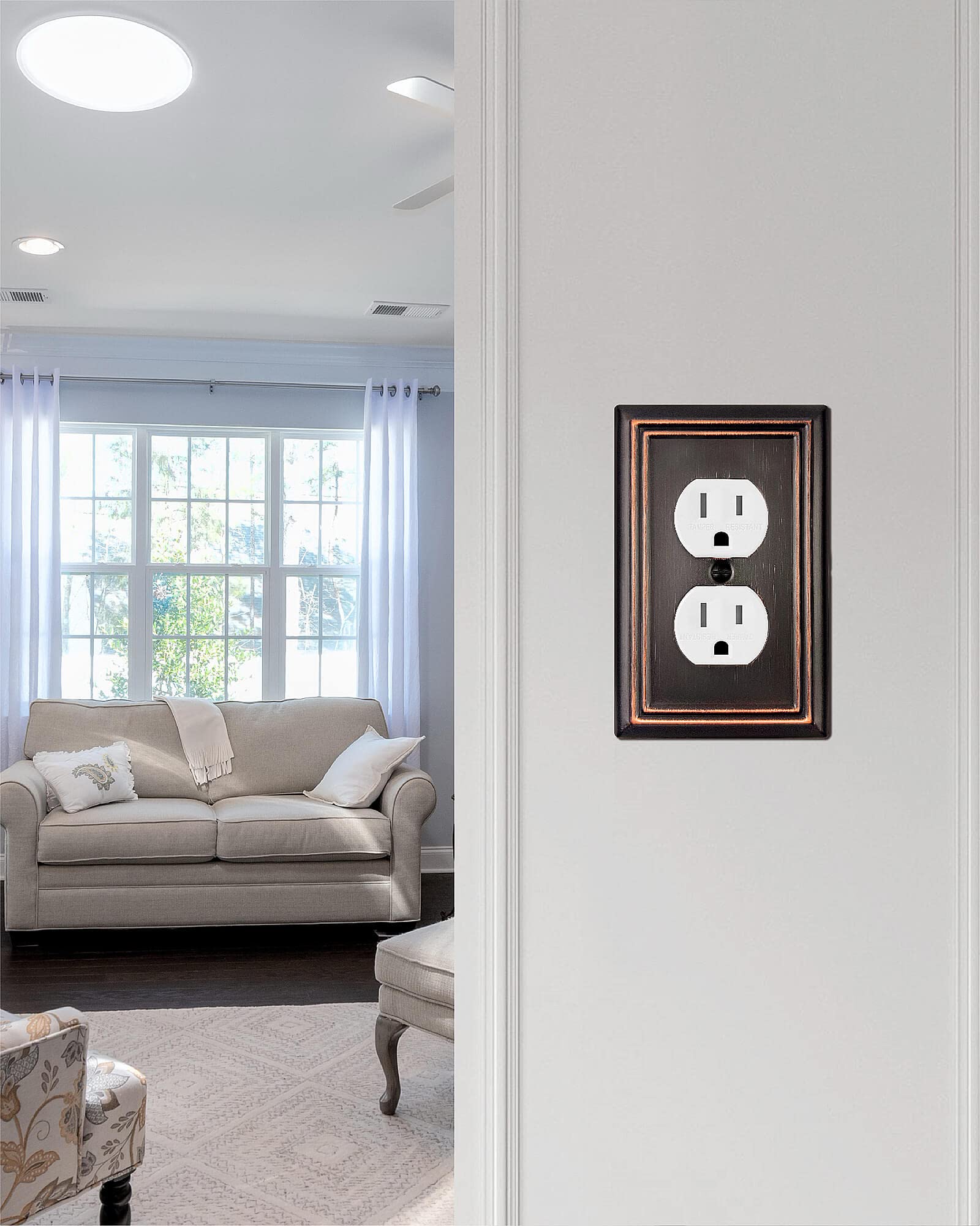 Close-up of ZILLSEA aged bronze outlet covers showing durable finish.