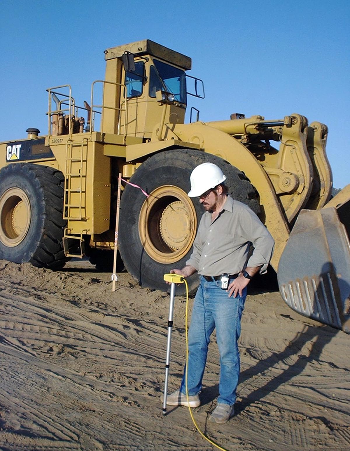 ZIPLEVEL PRO-2030 anchoring stakes stabilize measurements during rugged job sites.