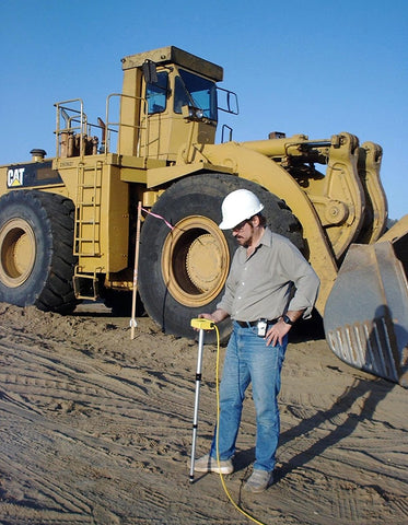 ZIPLEVEL PRO-2030 anchoring stakes stabilize measurements during rugged job sites.
