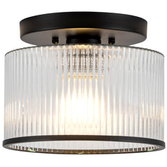 Zlepmlla glass ceiling light with ribbed shade for warm ambience.