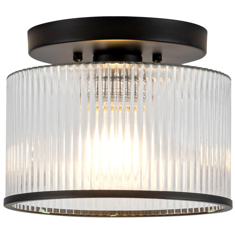 Zlepmlla glass ceiling light with ribbed shade for warm ambience.