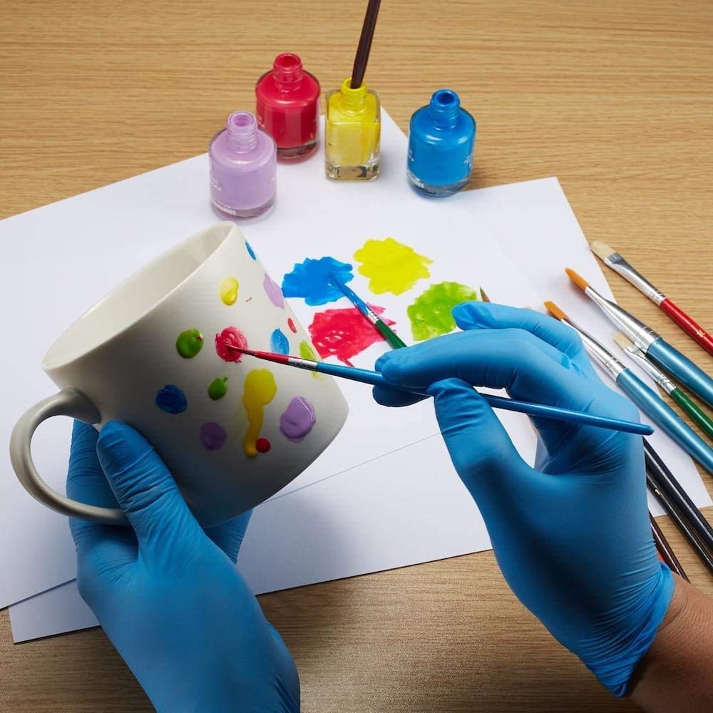 Zomchain nitrile kids gloves blue gardening activity keeps hands clean outdoors.