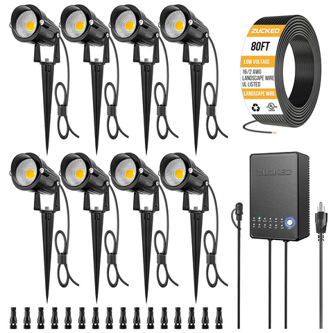 ZUCKEO landscape spotlight 8-pack illuminating yard and garden walkways.