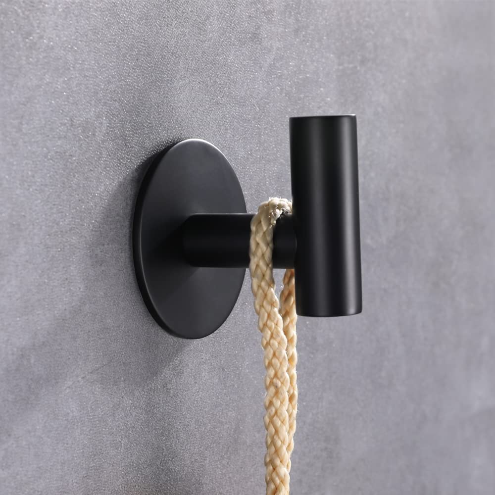 Zuvky matte black adhesive hooks mounted on a wall for easy, drill-free installation.