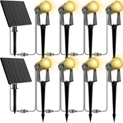 ZYAN solar landscape spotlights illuminate the front yard with welcoming warmth.