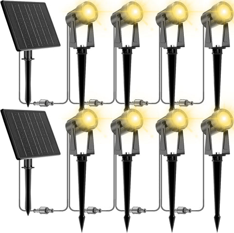 ZYAN solar landscape spotlights illuminate the front yard with welcoming warmth.